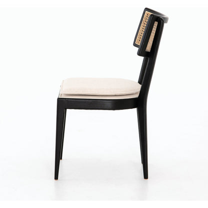 Britt Dining Chair by Four Hands in natural cane, savile flax, brushed ebony. Made from 92% polyester, 8% flax, linen, solid nettlewood, cane in a modern style.