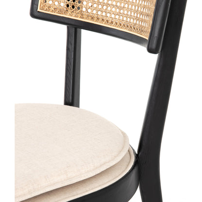 Britt Dining Chair by Four Hands in natural cane, savile flax, brushed ebony. Made from 92% polyester, 8% flax, linen, solid nettlewood, cane in a modern style.