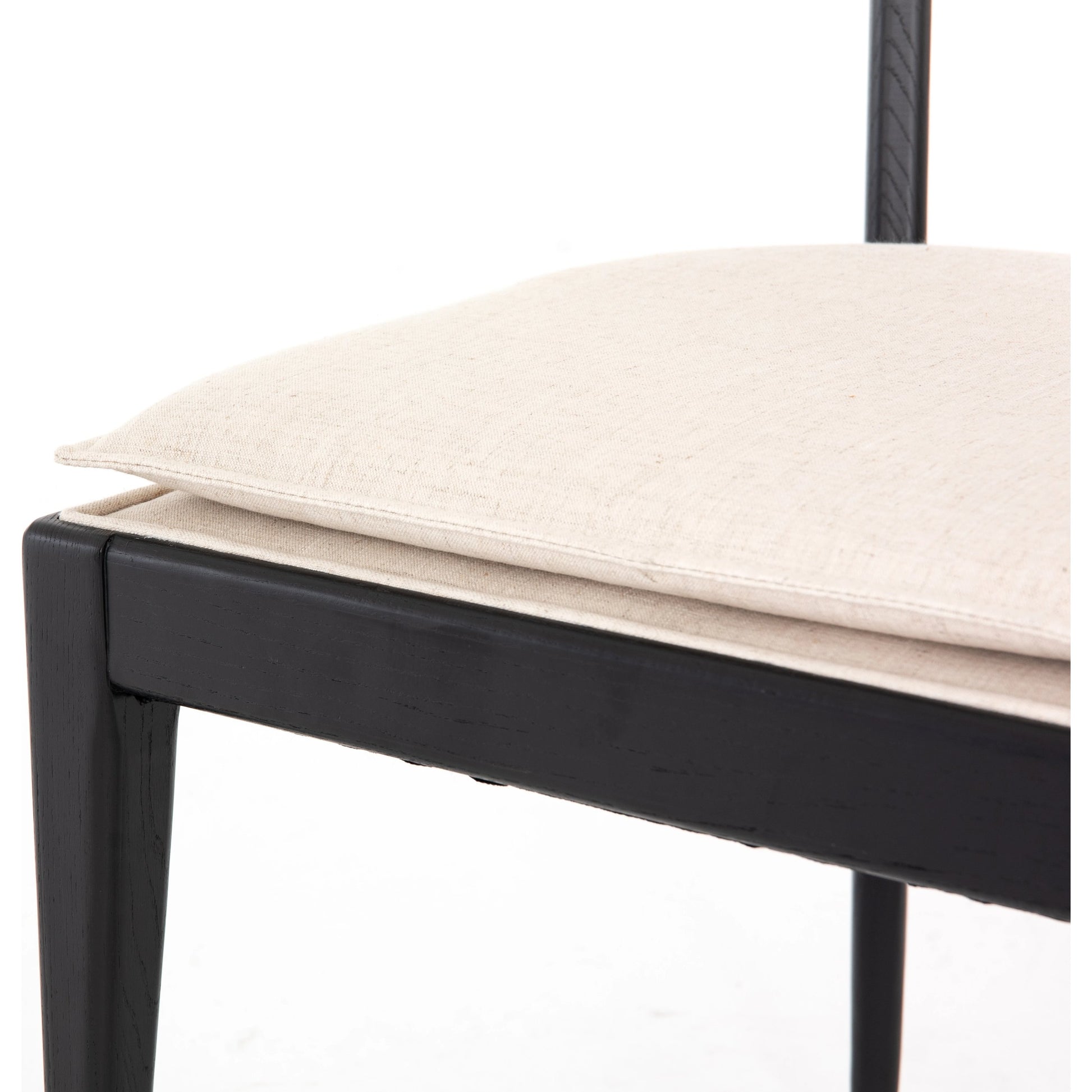 Britt Dining Chair by Four Hands in natural cane, savile flax, brushed ebony. Made from 92% polyester, 8% flax, linen, solid nettlewood, cane in a modern style.