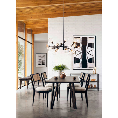 Britt Dining Chair by Four Hands in natural cane, savile flax, brushed ebony. Made from 92% polyester, 8% flax, linen, solid nettlewood, cane in a modern style.