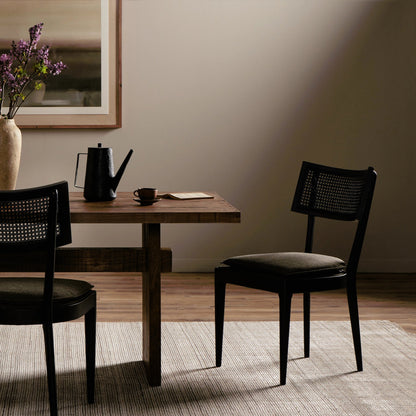 Britt Dining Chair by Four Hands in natural cane, savile flax, brushed ebony. Made from 92% polyester, 8% flax, linen, solid nettlewood, cane in a modern style.