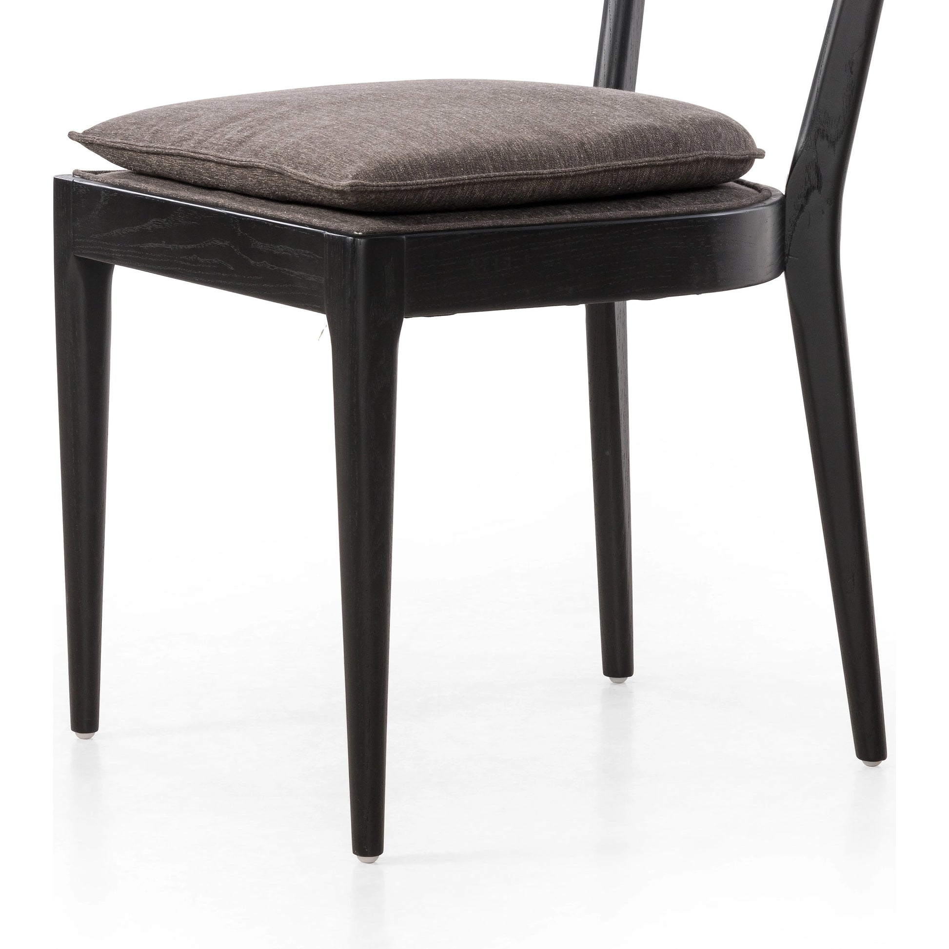 Britt Dining Chair by Four Hands in natural cane, savile flax, brushed ebony. Made from 92% polyester, 8% flax, linen, solid nettlewood, cane in a modern style.