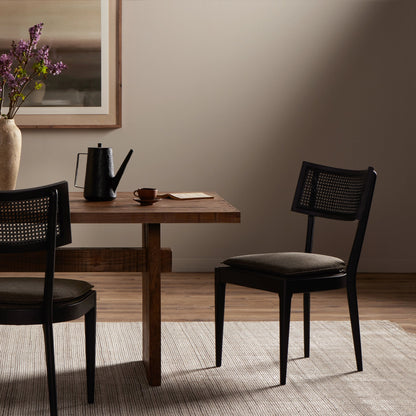 Britt Dining Chair by Four Hands in natural cane, savile flax, brushed ebony. Made from 92% polyester, 8% flax, linen, solid nettlewood, cane in a modern style.
