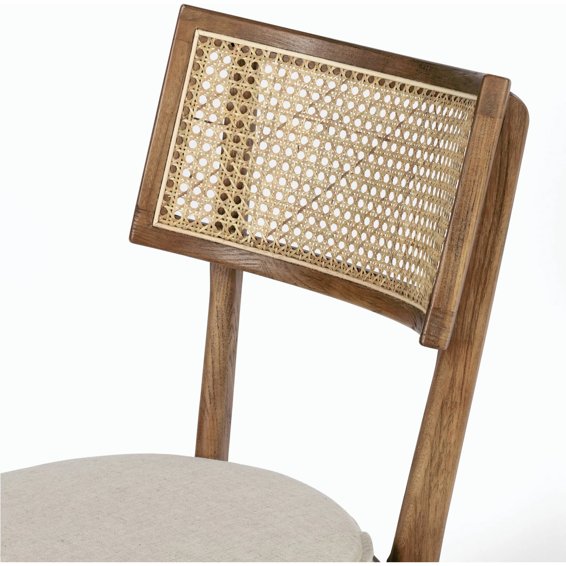 Britt Dining Chair by Four Hands in natural cane, savile flax, brushed ebony. Made from 92% polyester, 8% flax, linen, solid nettlewood, cane in a modern style.