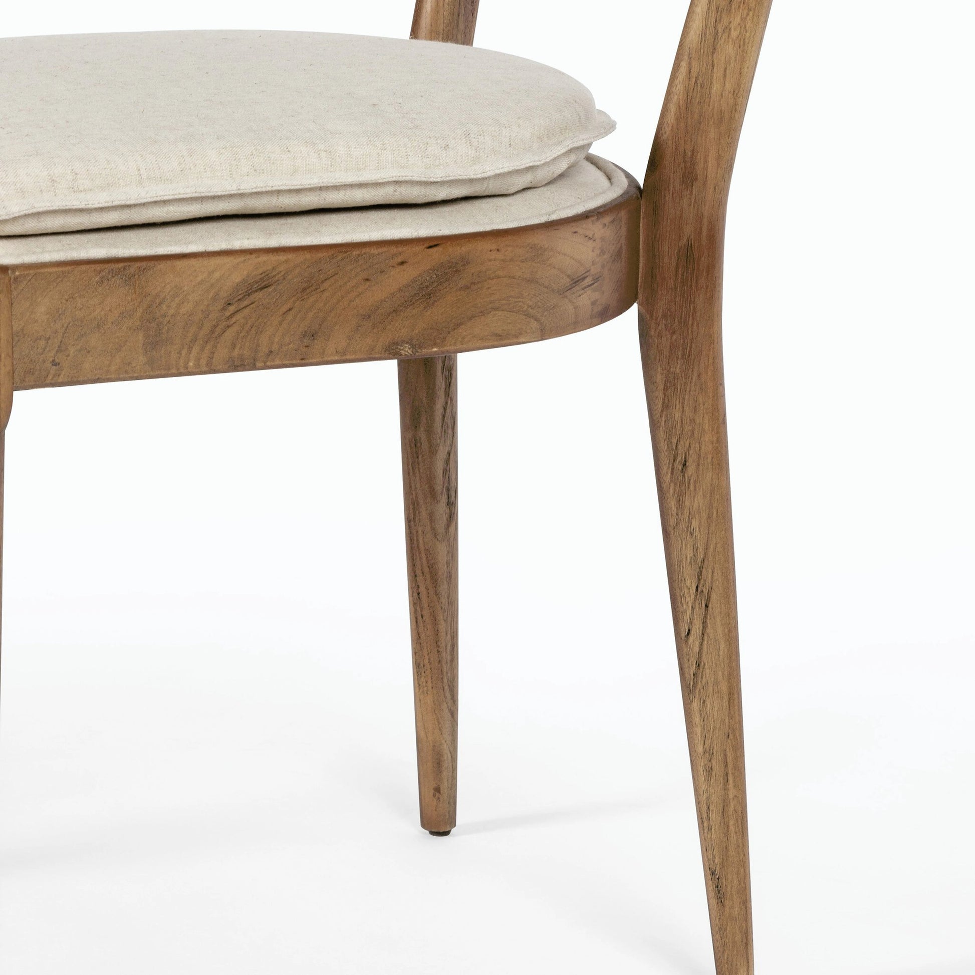 Britt Dining Chair by Four Hands in natural cane, savile flax, brushed ebony. Made from 92% polyester, 8% flax, linen, solid nettlewood, cane in a modern style.