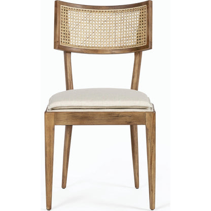 Britt Dining Chair by Four Hands in natural cane, savile flax, brushed ebony. Made from 92% polyester, 8% flax, linen, solid nettlewood, cane in a modern style.