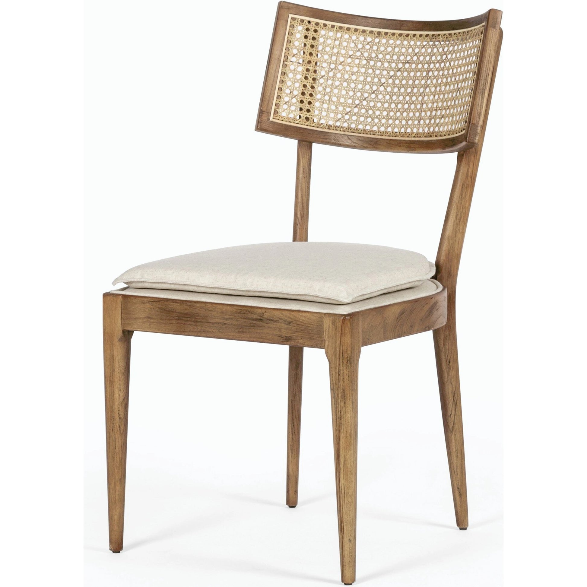 Britt Dining Chair by Four Hands in natural cane, savile flax, brushed ebony. Made from 92% polyester, 8% flax, linen, solid nettlewood, cane in a modern style.