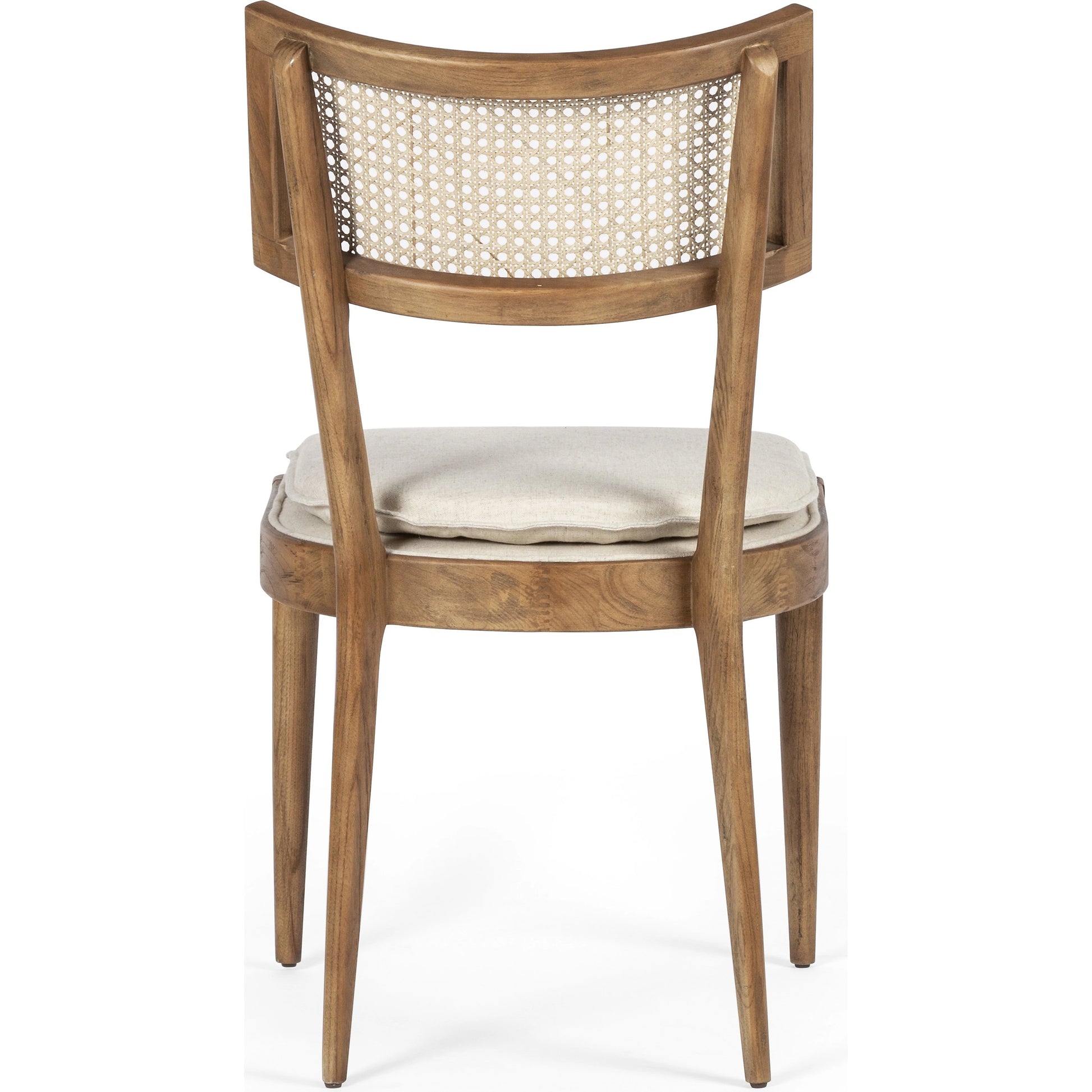 Britt Dining Chair by Four Hands in natural cane, savile flax, brushed ebony. Made from 92% polyester, 8% flax, linen, solid nettlewood, cane in a modern style.