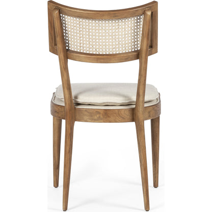 Britt Dining Chair by Four Hands in natural cane, savile flax, brushed ebony. Made from 92% polyester, 8% flax, linen, solid nettlewood, cane in a modern style.