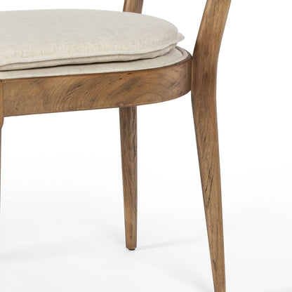 Britt Dining Chair by Four Hands in natural cane, savile flax, brushed ebony. Made from 92% polyester, 8% flax, linen, solid nettlewood, cane in a modern style.