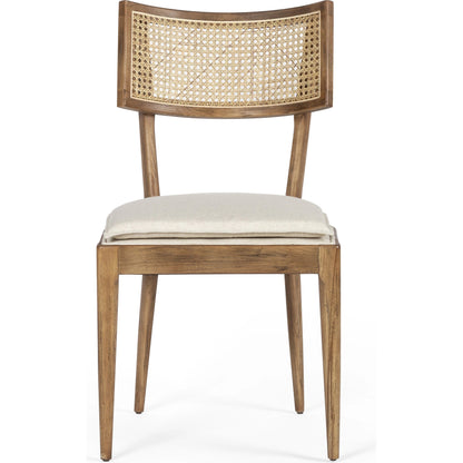 Britt Dining Chair by Four Hands in natural cane, savile flax, brushed ebony. Made from 92% polyester, 8% flax, linen, solid nettlewood, cane in a modern style.
