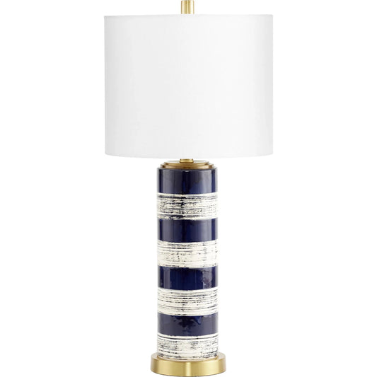 Bristle Brush Table Lamp by Cyan Design in blue. Made from ceramic with off white linen shade in a transitional style.