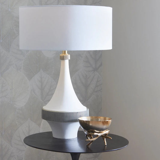 Saratoga Table Lamp by Cyan Design in white. Made from stone composite with white linen shade in a eclectic & global style.