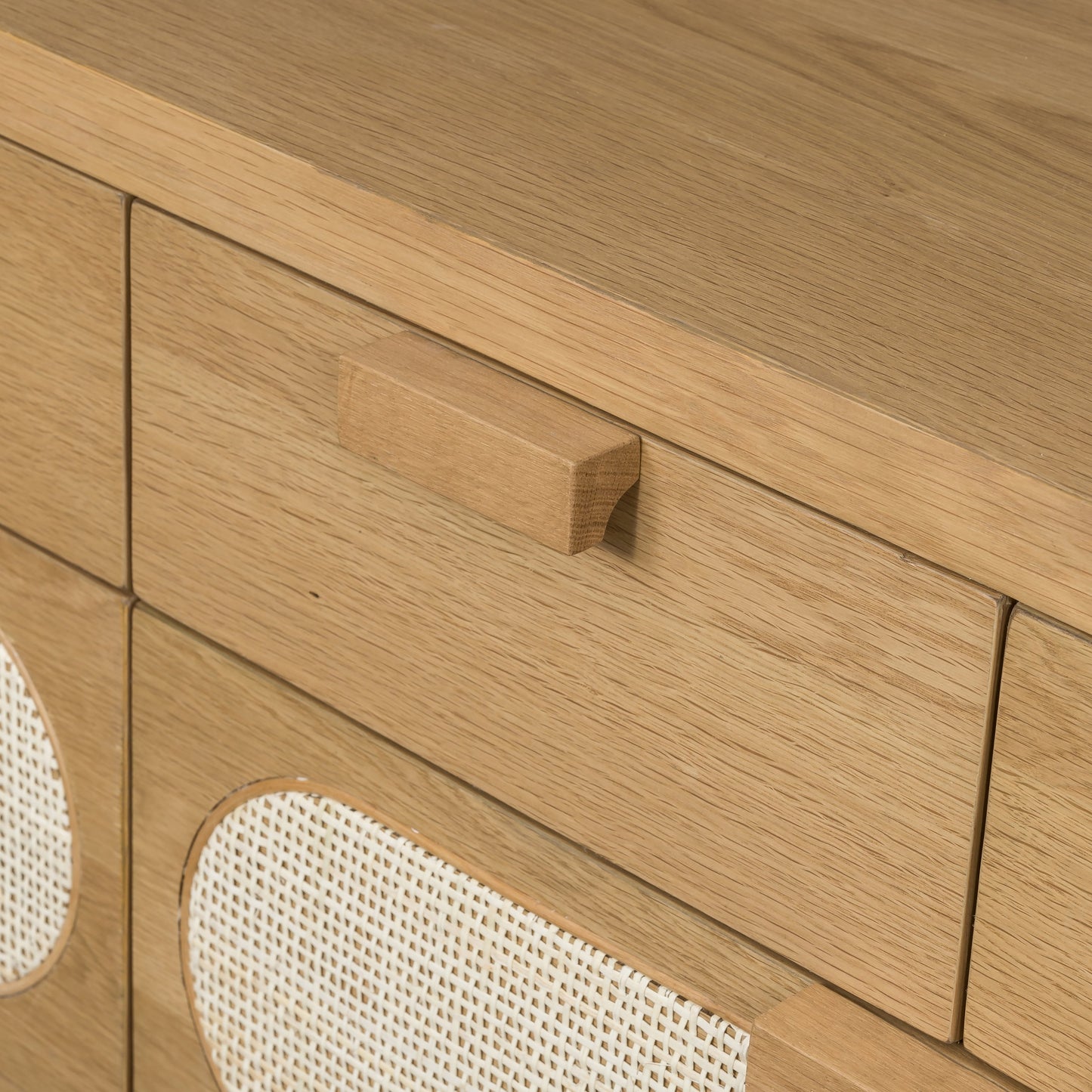 010 SI-1714146 | Closeup | Allegra 8 Drawer Dresser by Four Hands in light natural cane, honey oak veneer. Made from cane, oak veneer in a rustic style.