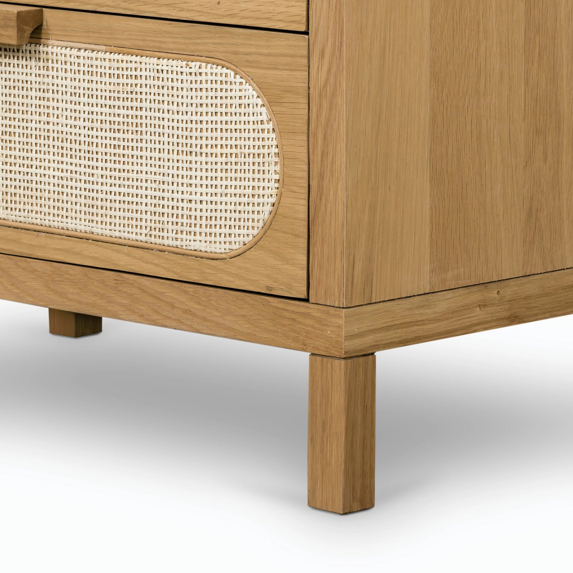 Allegra 5 Drawer Dresser by Four Hands in honey oak veneer, light natural cane, honey oak and honey oak. Made from oak veneer, cane, solid oak in a rustic style.