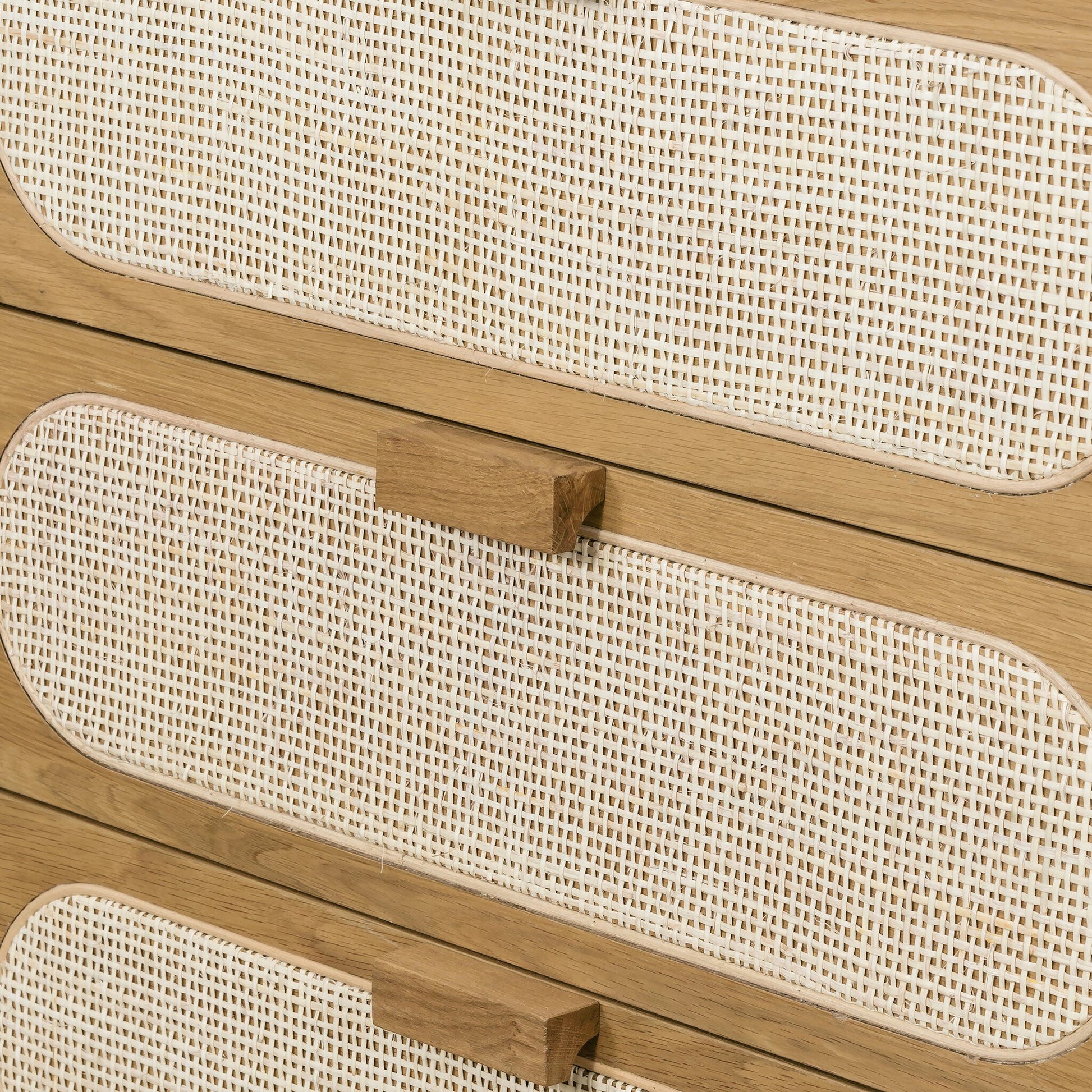 Allegra 5 Drawer Dresser by Four Hands in honey oak veneer, light natural cane, honey oak and honey oak. Made from oak veneer, cane, solid oak in a rustic style.