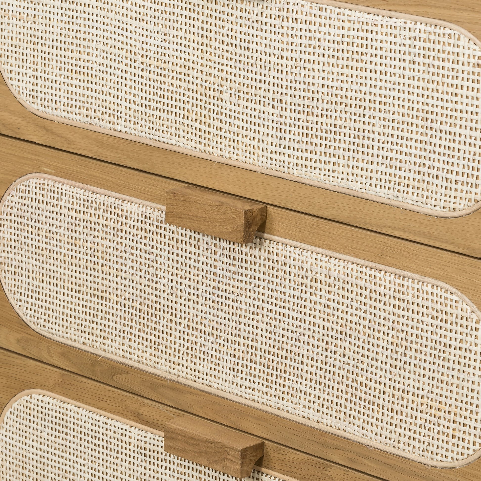 Allegra 5 Drawer Dresser by Four Hands in honey oak veneer, light natural cane, honey oak and honey oak. Made from oak veneer, cane, solid oak in a rustic style.