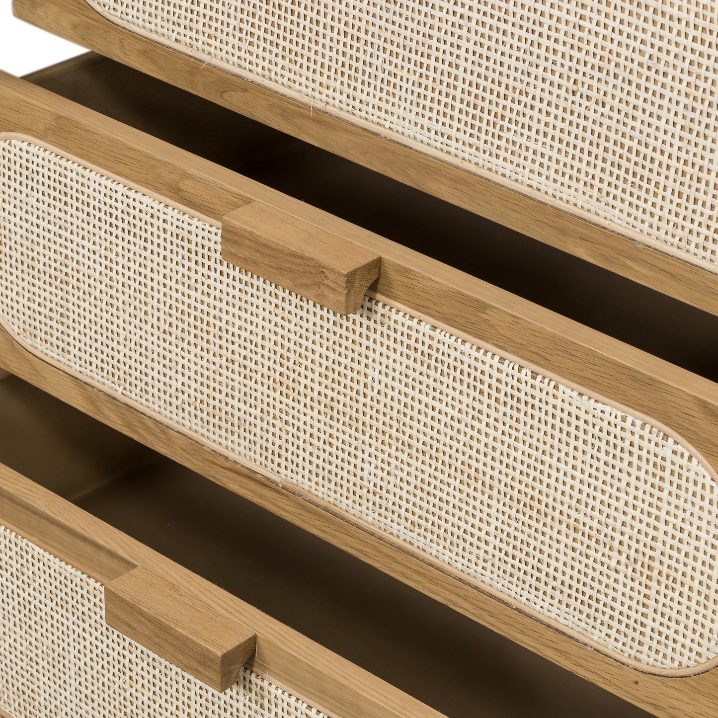 008 SI-1714145 | Closeup | Allegra 5 Drawer Dresser by Four Hands in honey oak veneer, light natural cane, honey oak and honey oak. Made from oak veneer, cane, solid oak in a rustic style.