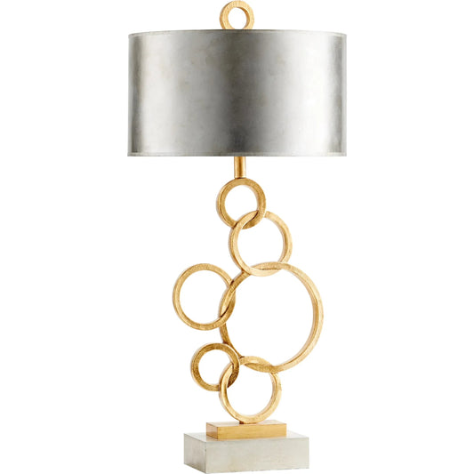 Cercles Table Lamp by Cyan Design in silver, gold. Made from resin, wood with gray paper shade in a transitional style.