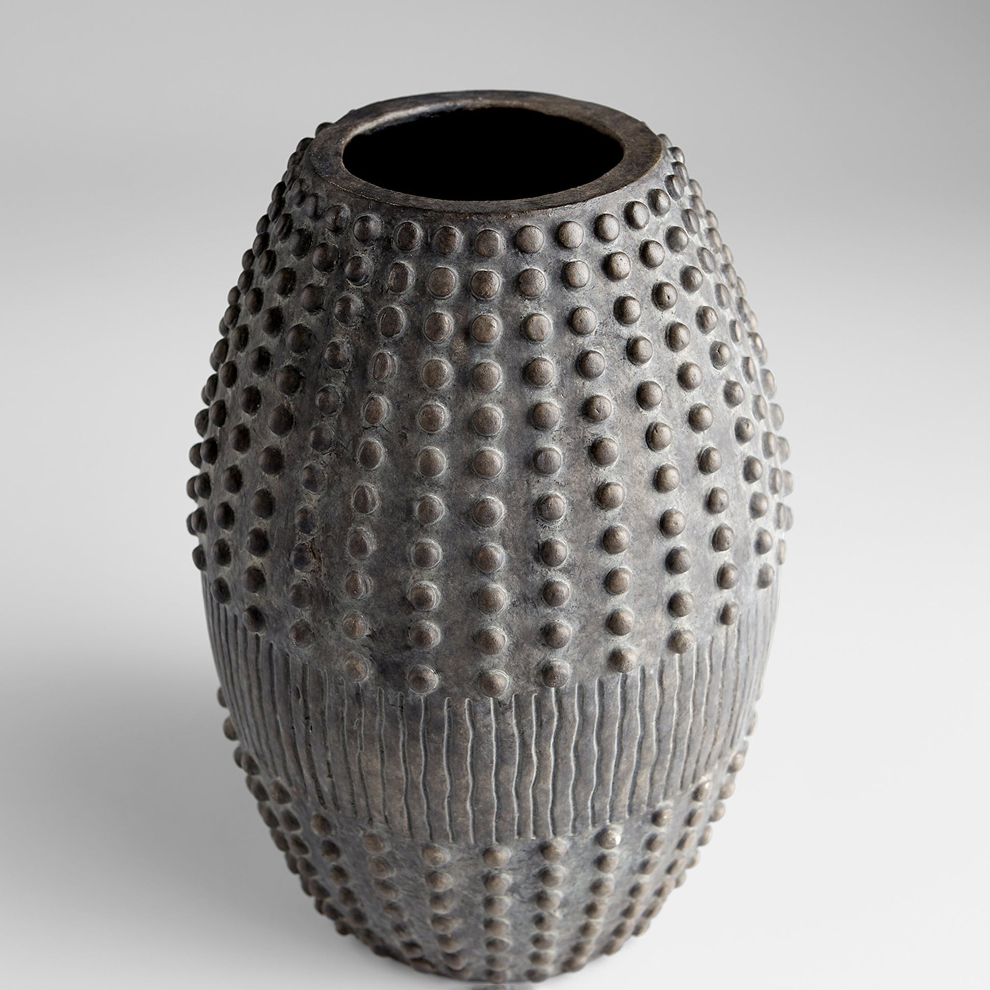 Scoria Planter by Cyan Design in gray. Made from ceramic in a eclectic & global style.