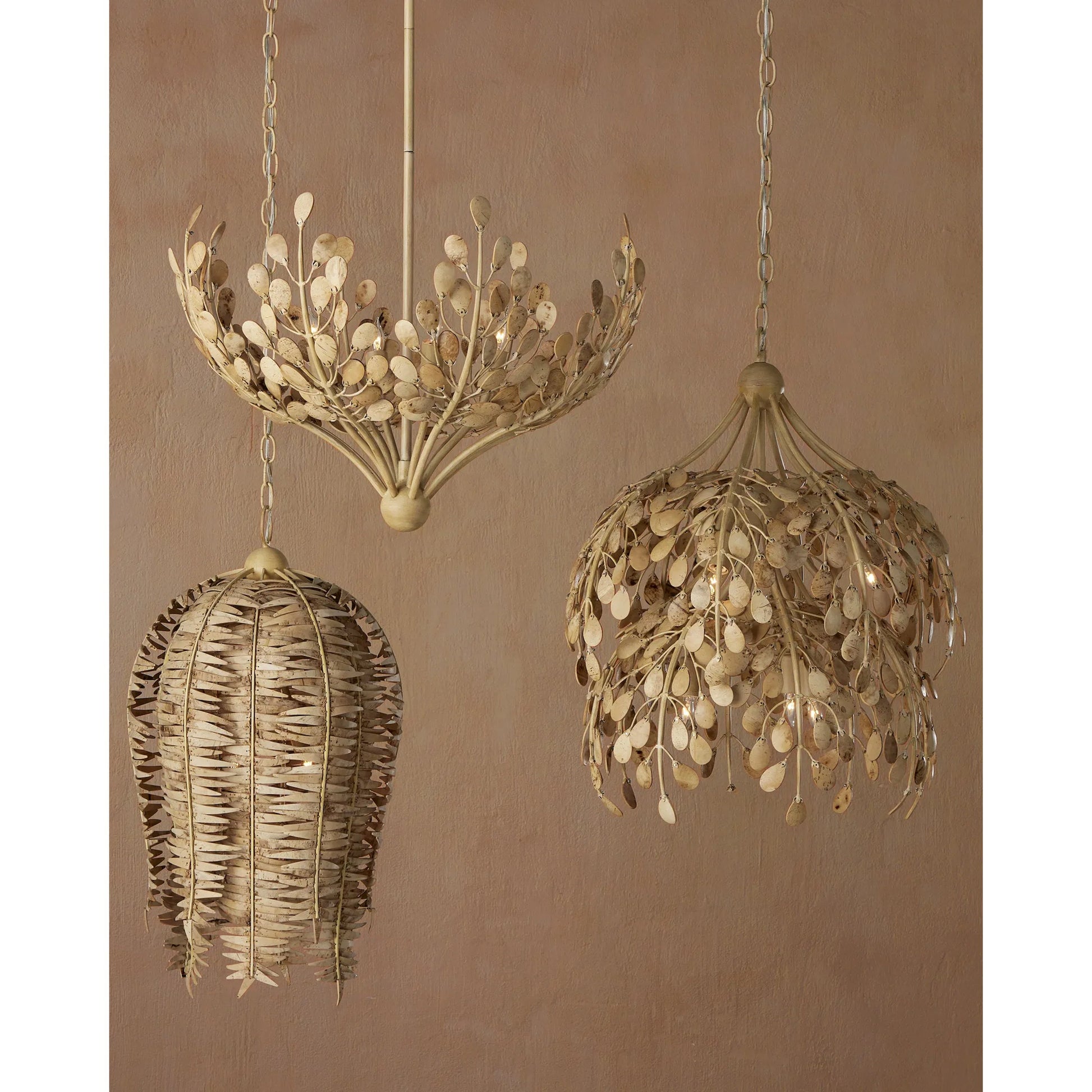 Maypan Chandelier by Currey and Company in coco cream, natural. Made from wrought iron, coco shells in a modern style.