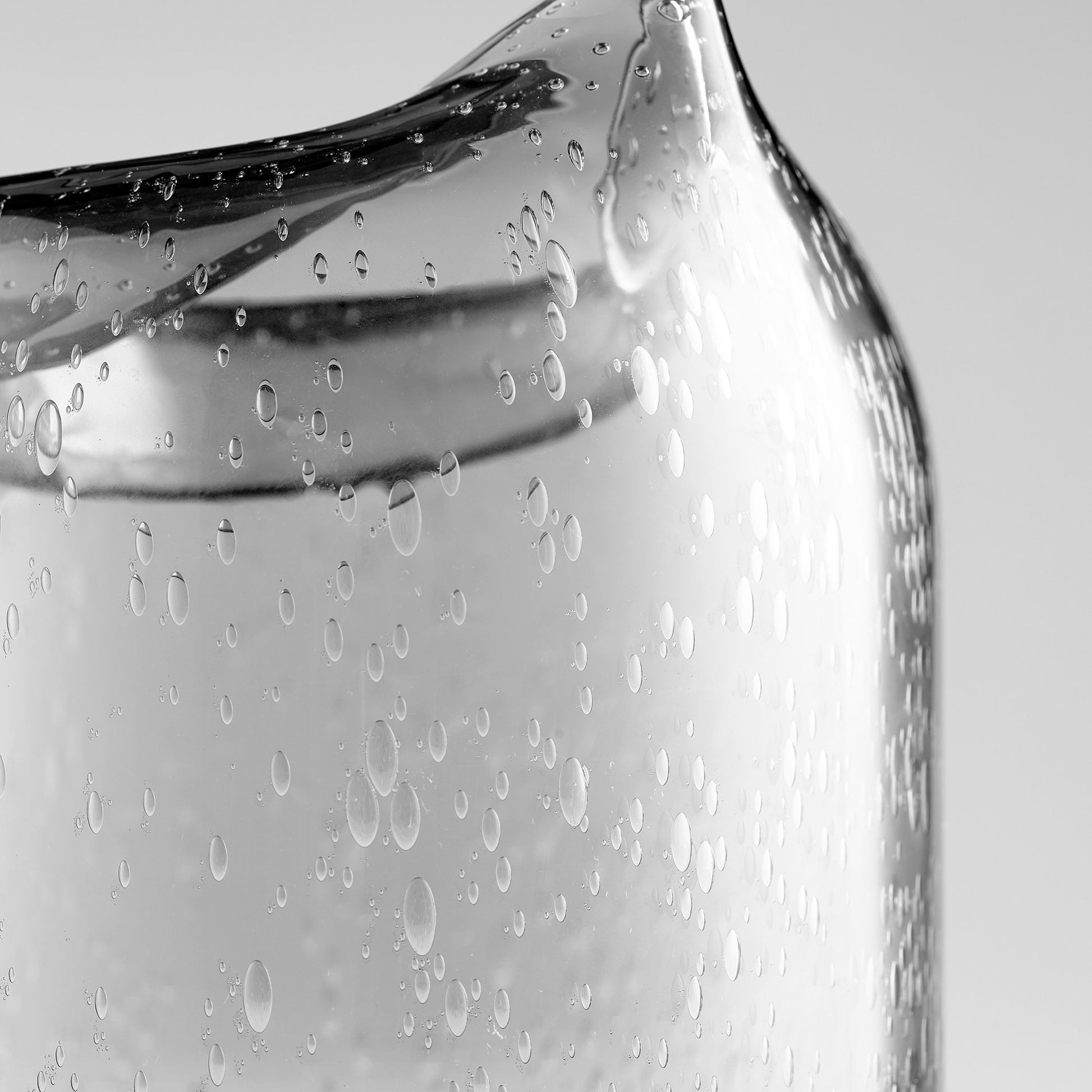 Oxtail Vase by Cyan Design in clear. Made from glass in a eclectic & global style.