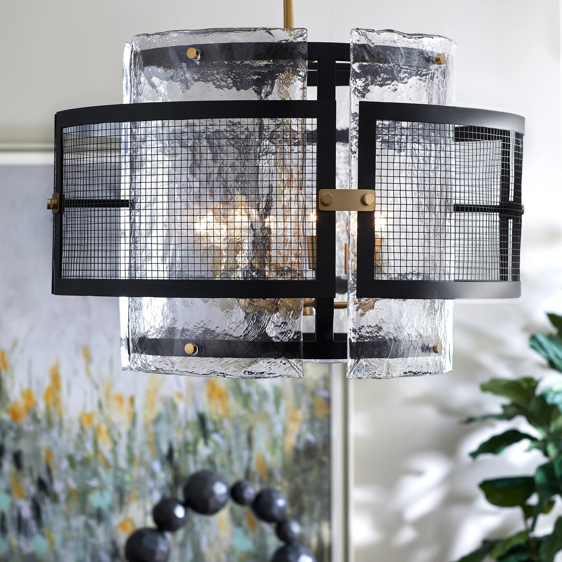 Panorama Chandelier by Cyan Design in noir, aged brass. Made from iron, glass in a modern style.