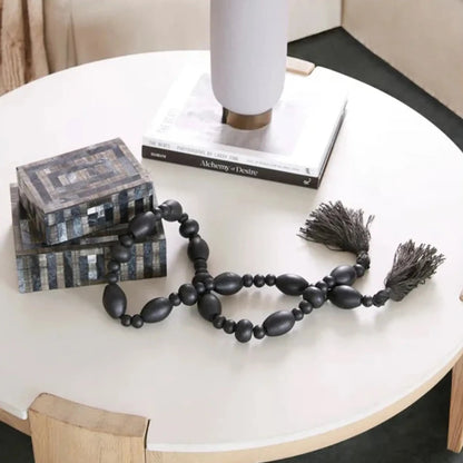 Blizzard Stone Beads by Cyan Design in black. Made from wood in a modern style.