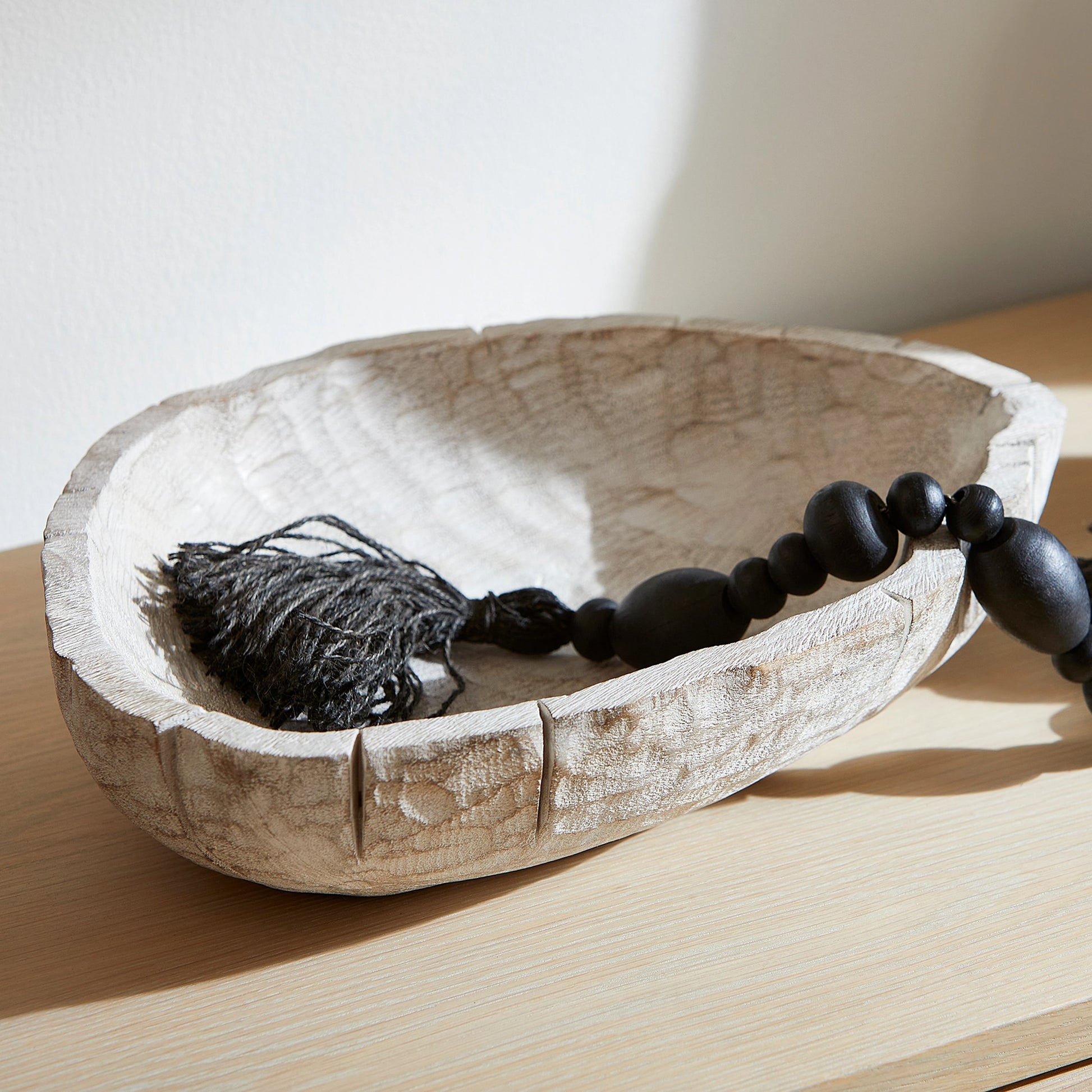 Blizzard Stone Beads by Cyan Design in black. Made from wood in a modern style.