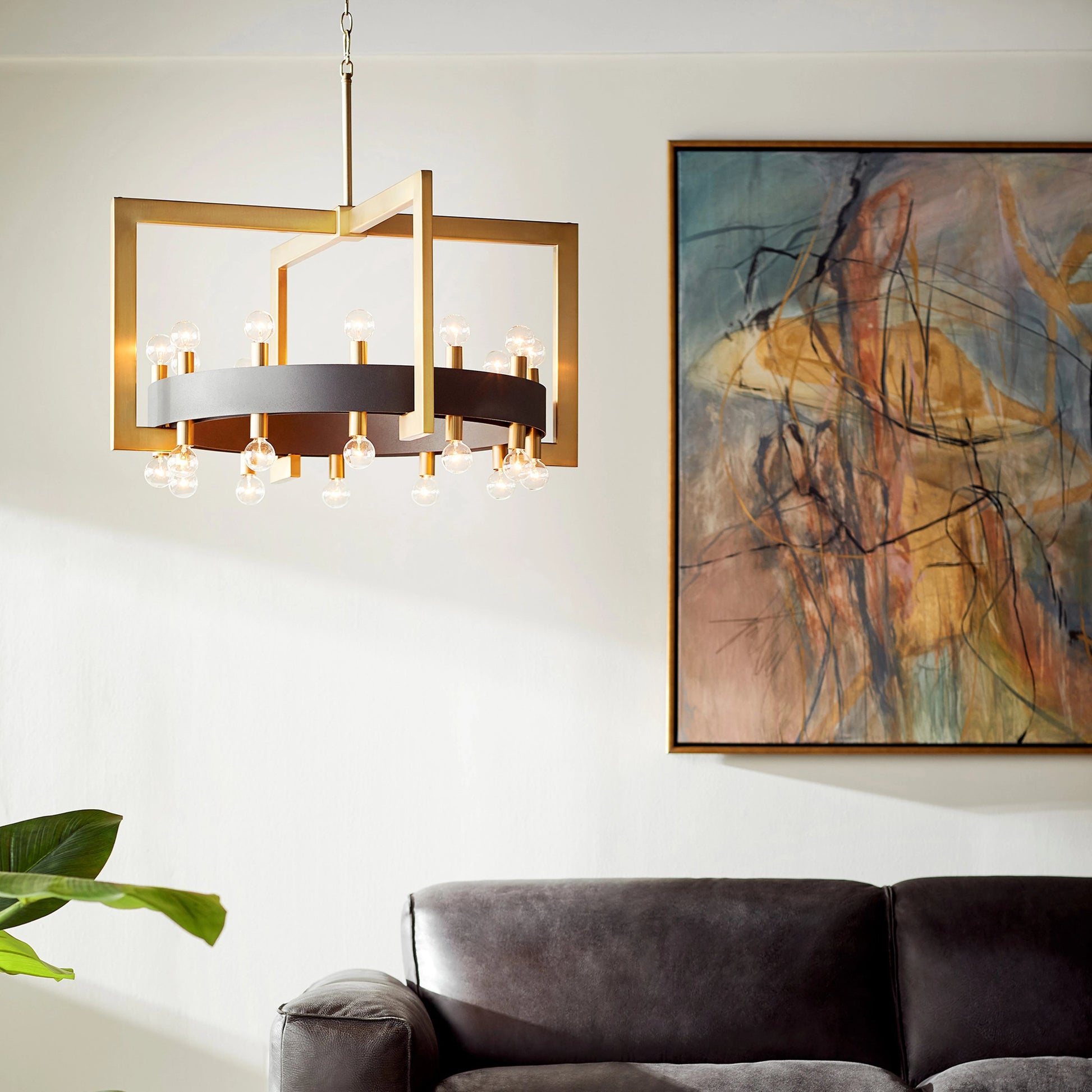 Archibald Chandelier by Cyan Design in noir, aged brass. Made from iron in a modern style.