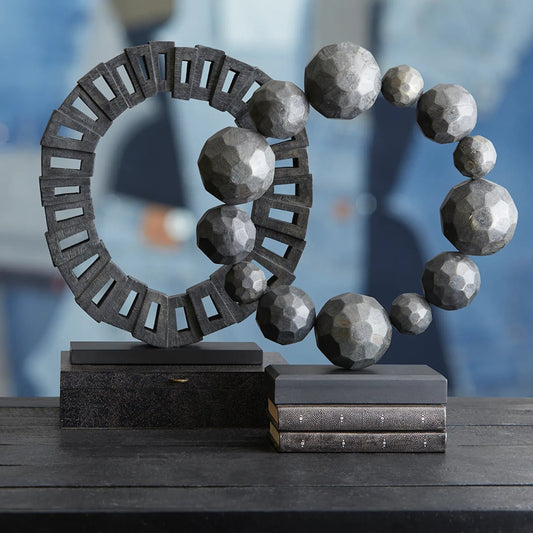 Garnet Sculpture by Cyan Design in black. Made from wood in a modern style.