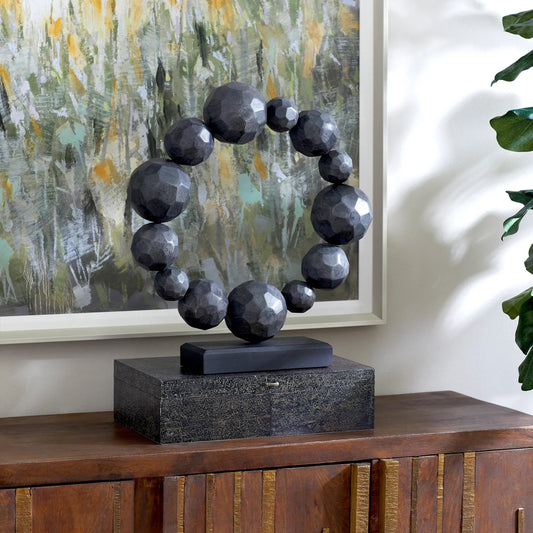 Garnet Sculpture by Cyan Design in black. Made from wood in a modern style.