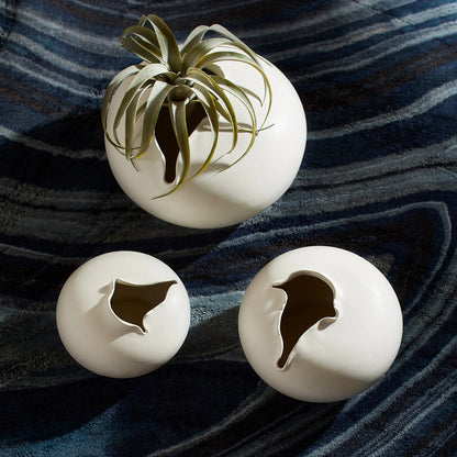 Tambora Vase by Cyan Design in black metal. Made from ceramic in a modern style.