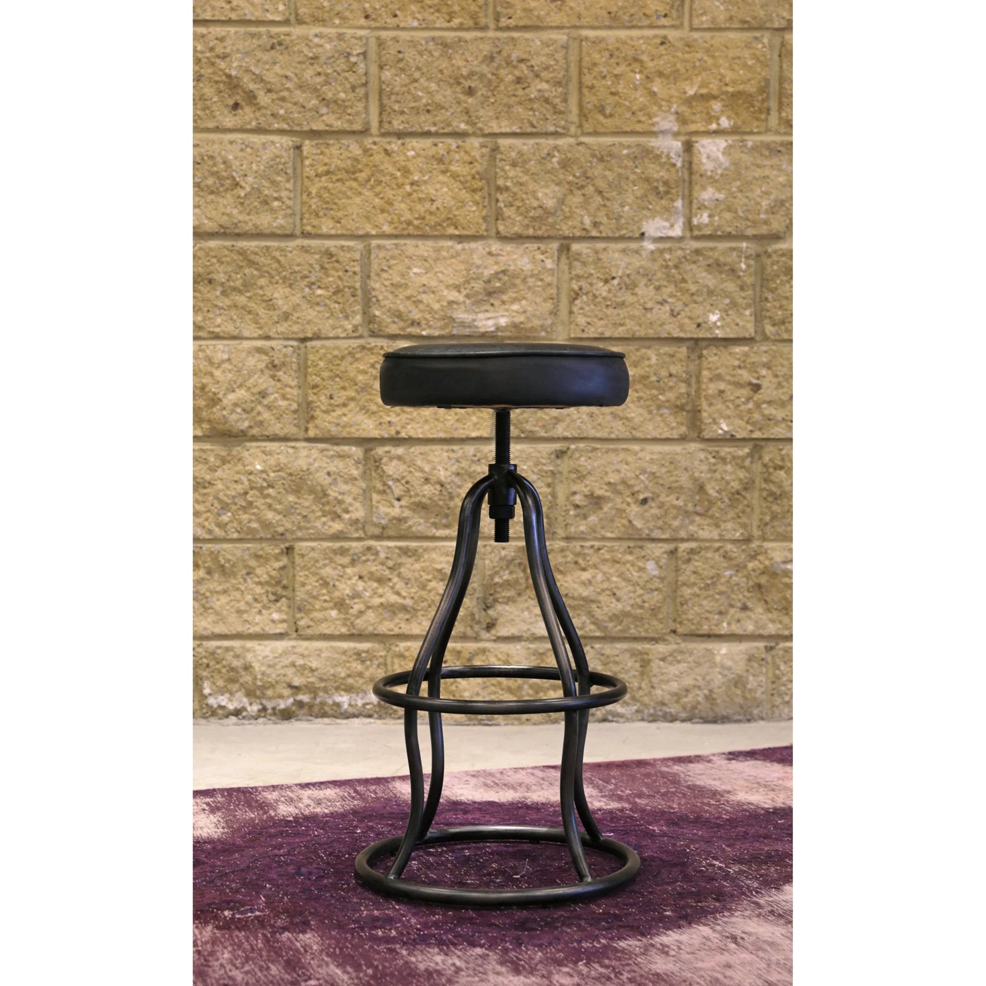 Bowie Bar Stool by LH Imports. Made from leather, metal in a rustic style.