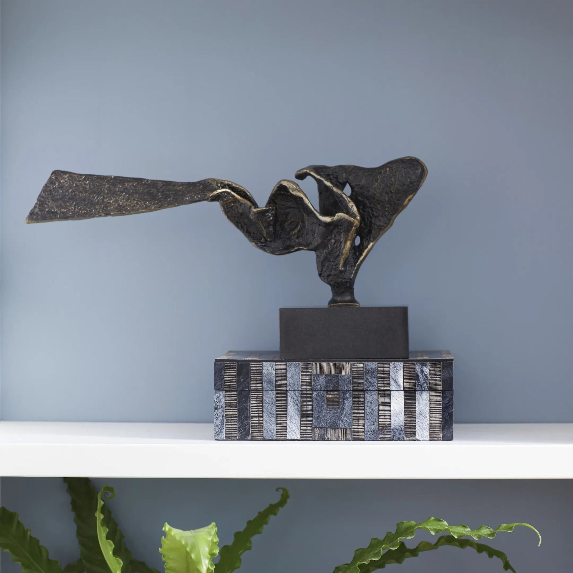 Squall Sculpture by Cyan Design in bronze. Made from iron, granite in a modern style.