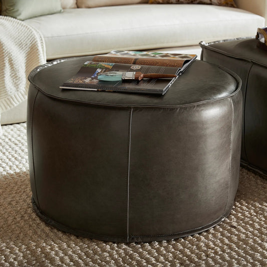 Lusso Round Ottoman by Cyan Design in grey. Made from unique in a unique style.