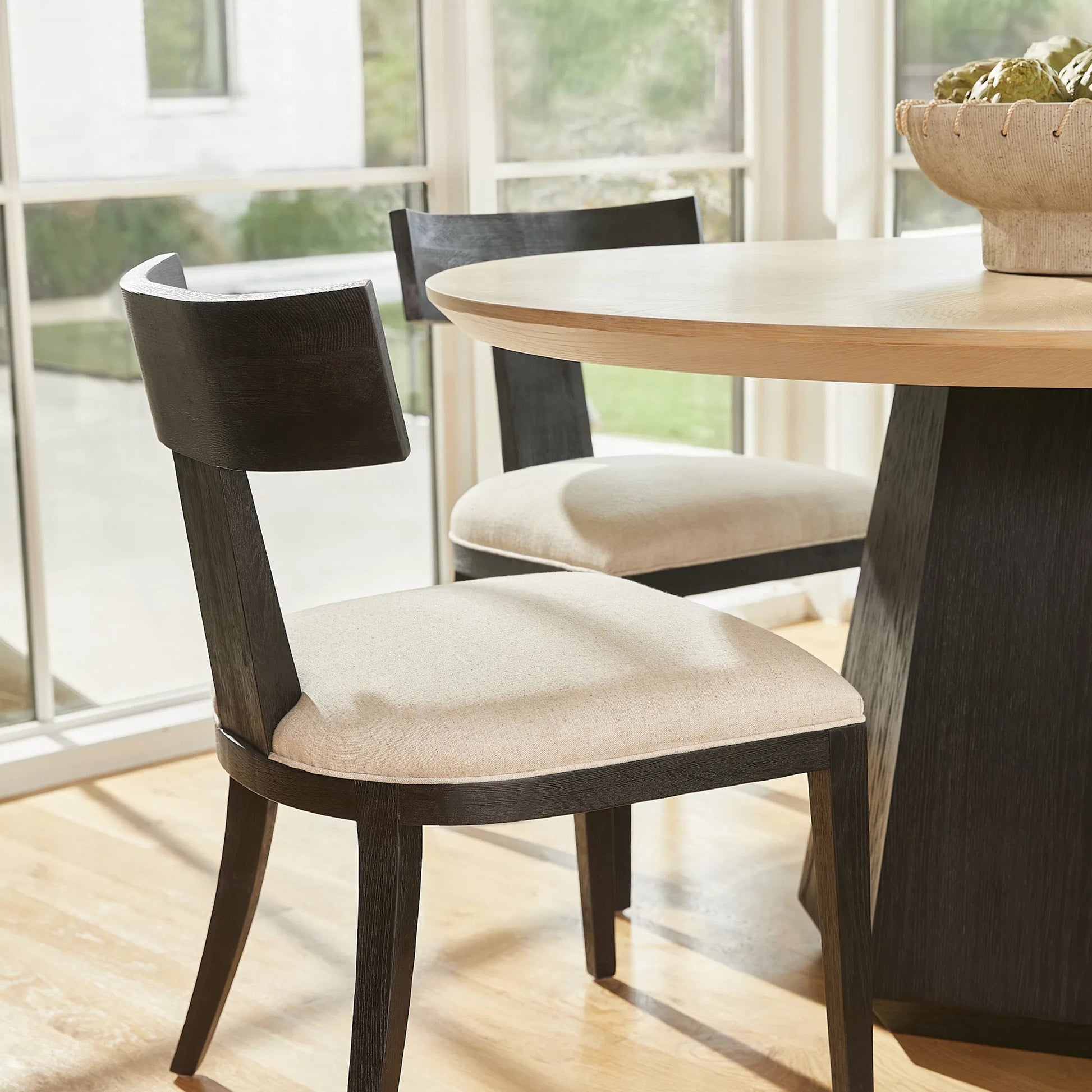 Sedia Dining Chair by Cyan Design in black. Made from unique in a transitional style.