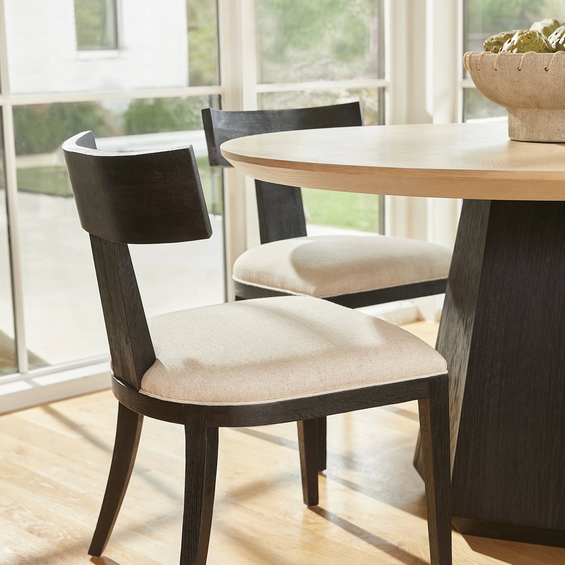 Sedia Dining Chair by Cyan Design in black. Made from unique in a transitional style.