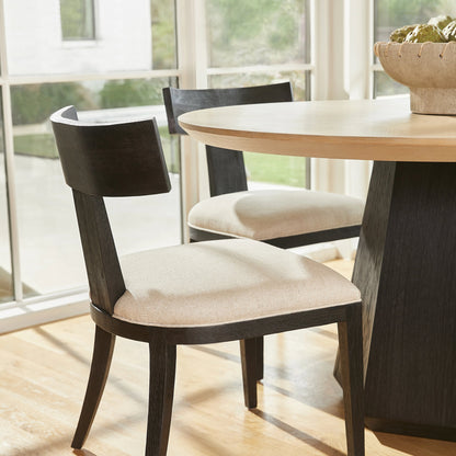 Sedia Dining Chair by Cyan Design in black. Made from unique in a transitional style.