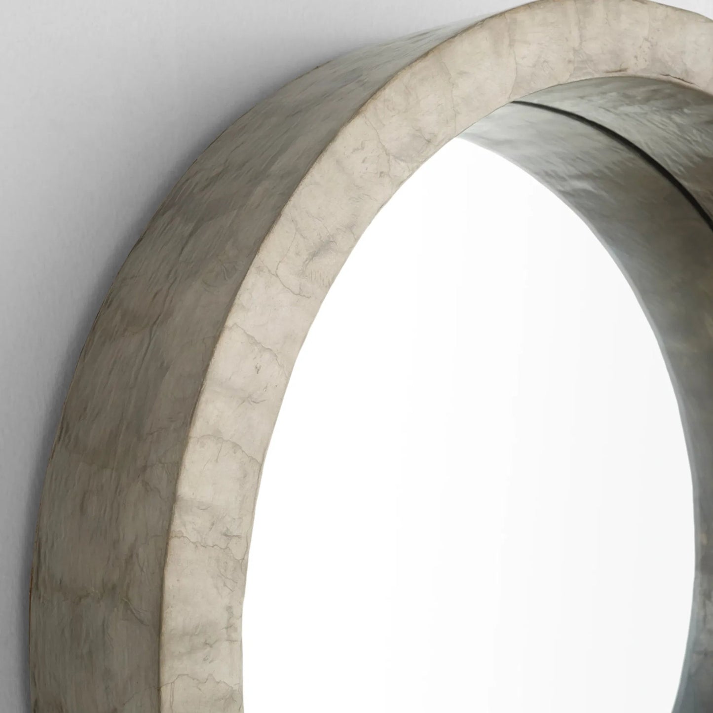 008 SI-1987433 | Closeup | Triton Round Mirror by Cyan Design. Made from capiz, wood, mirrored glass in a modern style.
