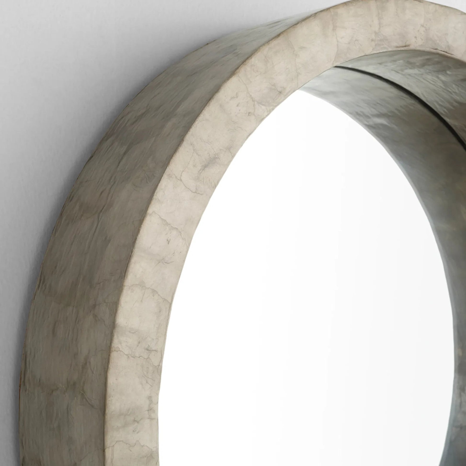 Triton Round Mirror by Cyan Design. Made from capiz, wood, mirrored glass in a modern style.