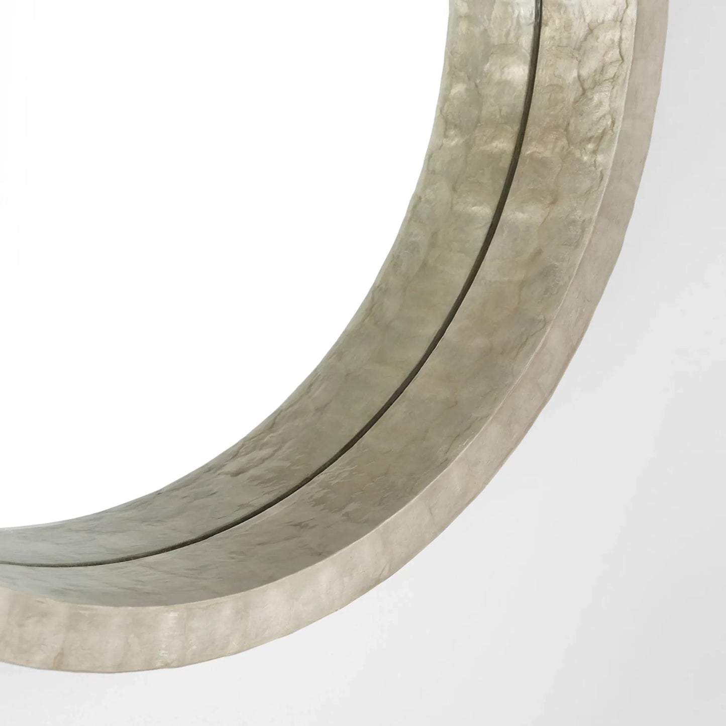 032 SI-1987434 | Closeup | Triton Round Mirror by Cyan Design. Made from capiz, wood, mirrored glass in a modern style.