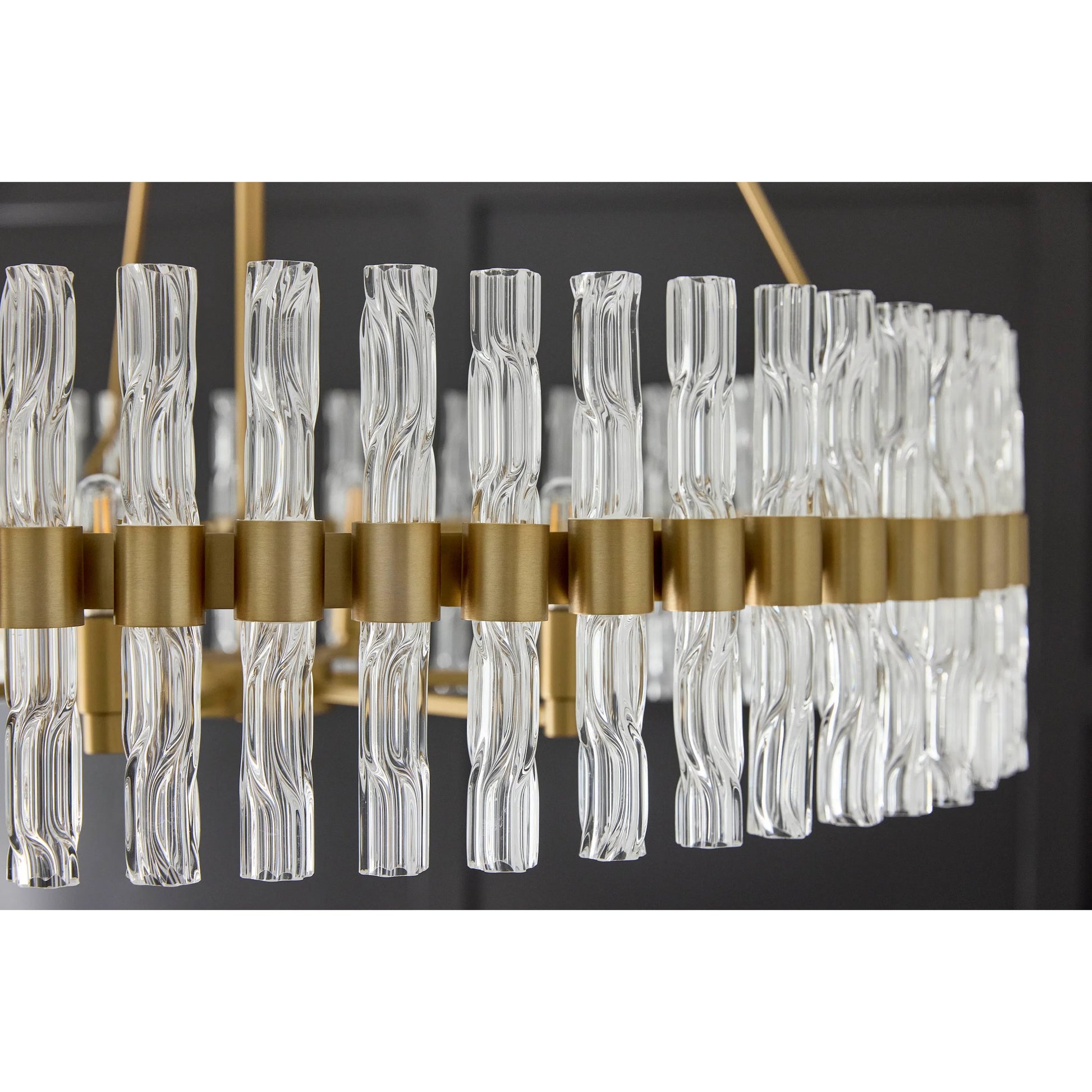 Noble 6 Light Chandelier by Cyan Design in aged brass. Made from unique in a modern style.