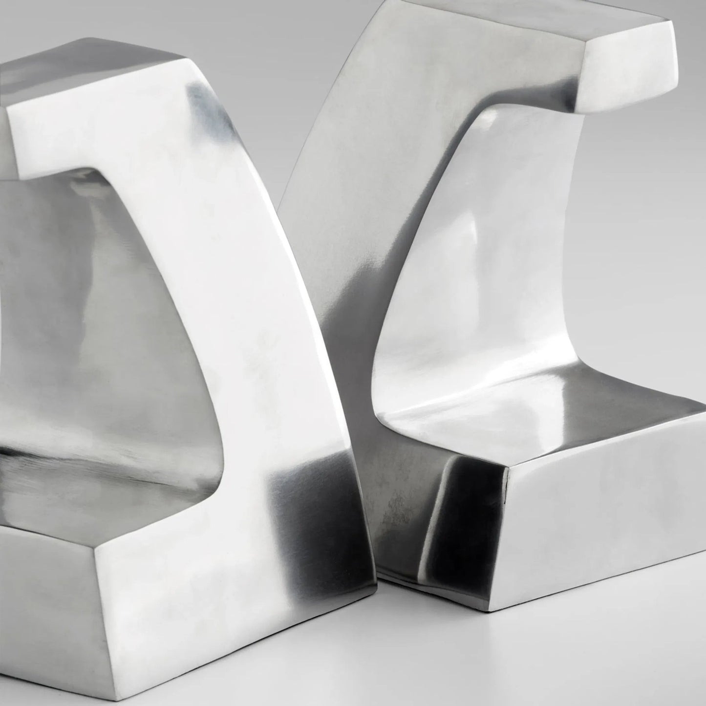 013 SI-2130373 | Additional Silo | Apostrophe Bookends in Polished Aluminum by Cyan Design in polished aluminum. Made from unique in a modern style.