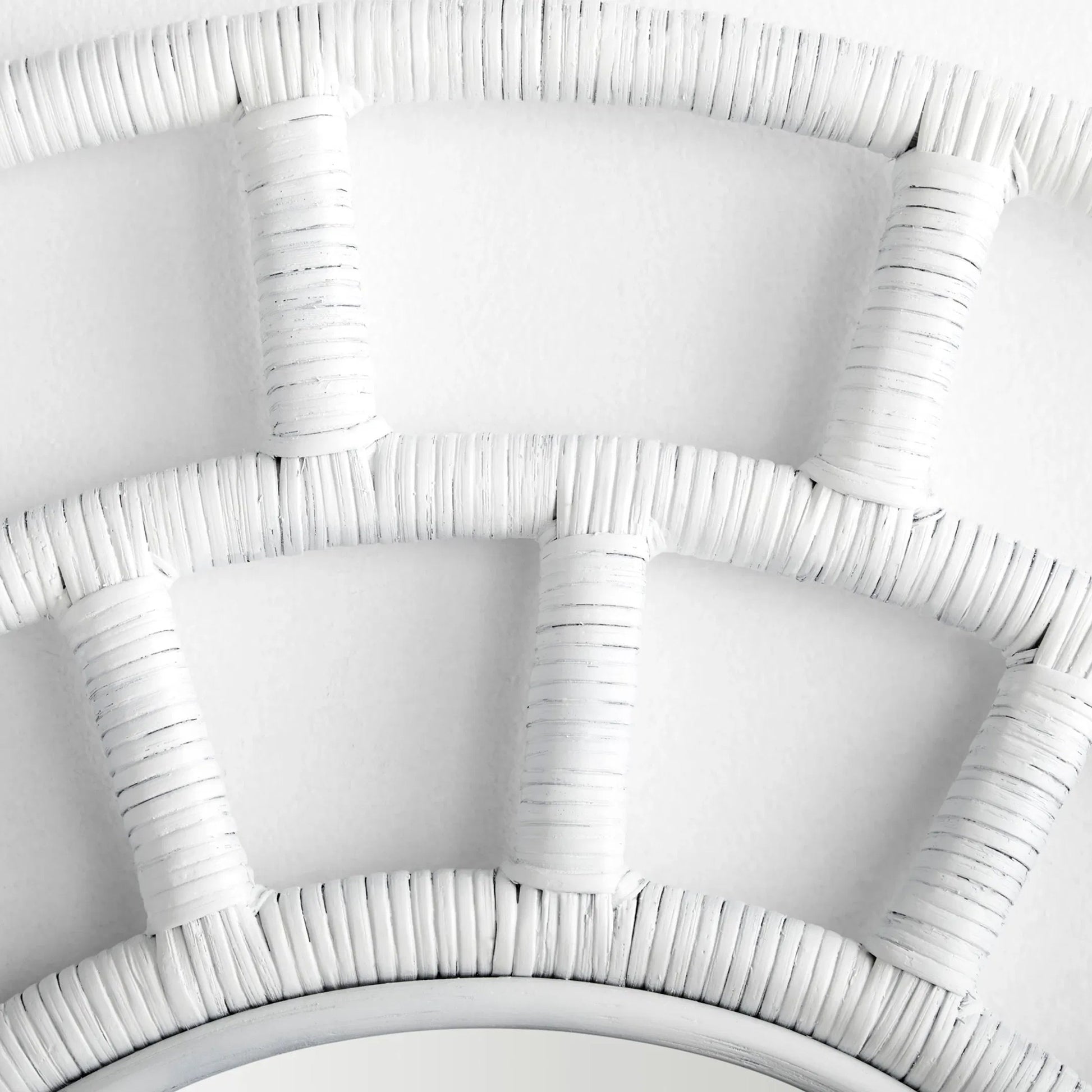 Comoros Mirror by Cyan Design. Made from rattan, wood, mirrored glass in a modern style.