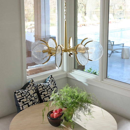 Alton 8-Light Chandelier by Cyan Design in aged brass. Made from iron, glass in a unique style.