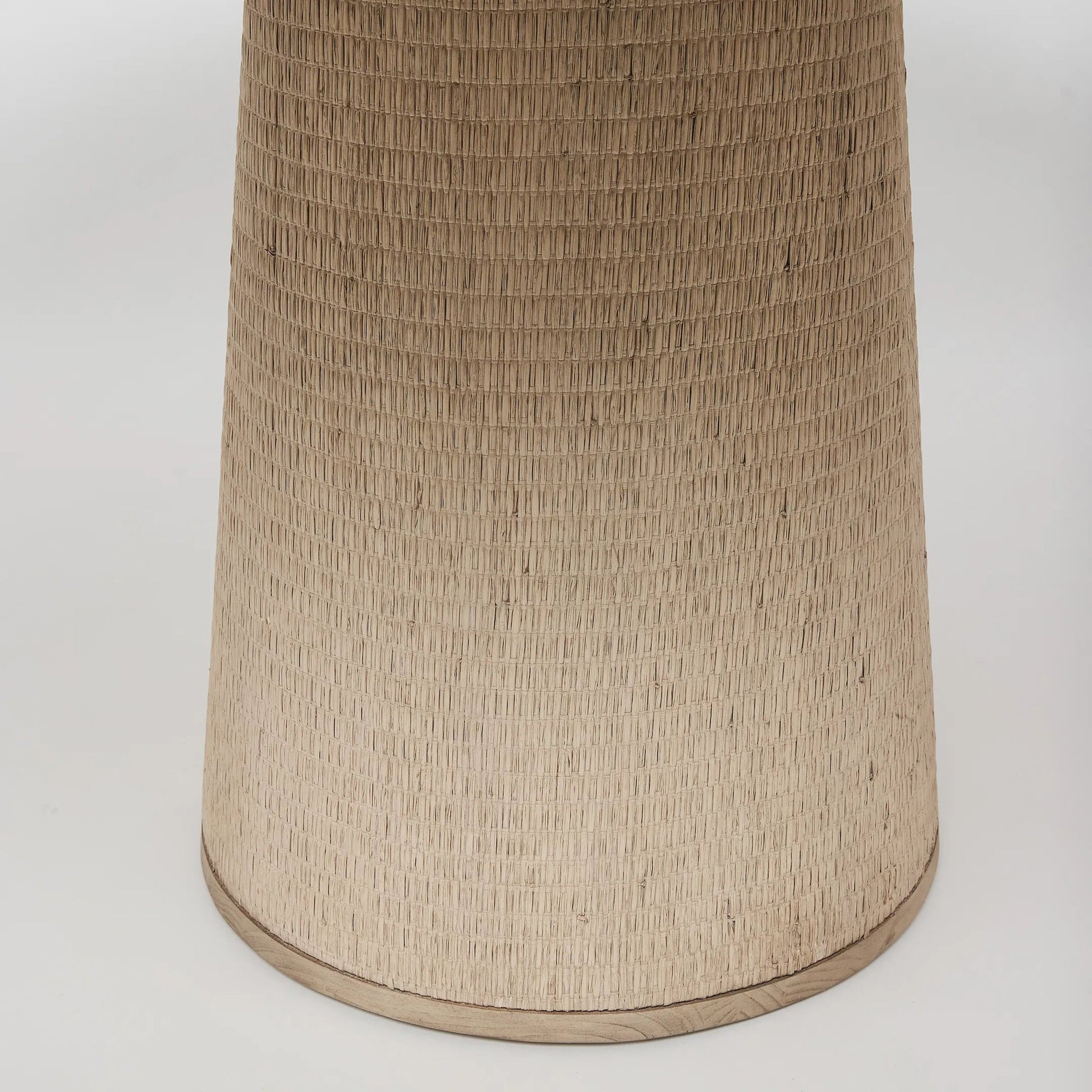 Harperly Dining Table by Interlude Home in washed taupe, satin aged bronze. Made from sungkai wood, raffia, metal in a transitional style.
