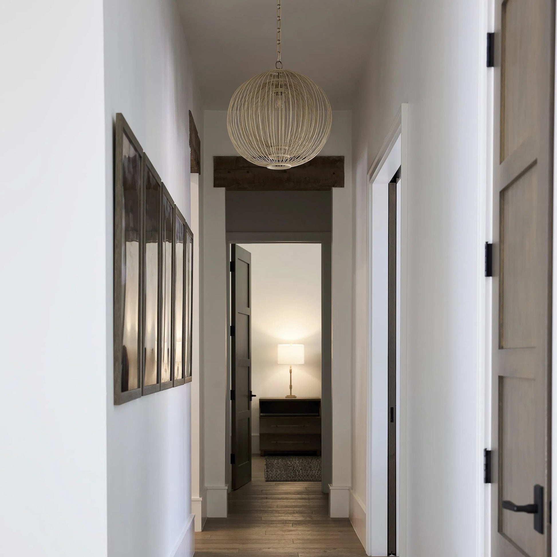 Terrae Round Pendant by Cyan Design in aged brass. Made from rattan, metal in a rustic style.