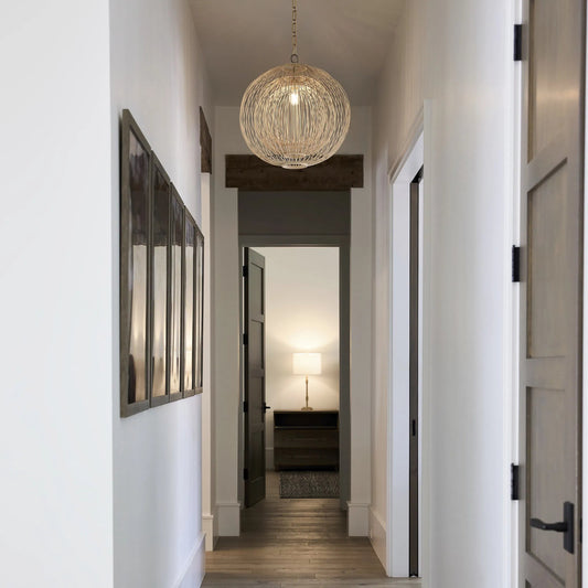 Terrae Round Pendant by Cyan Design in aged brass. Made from rattan, metal in a unique style.