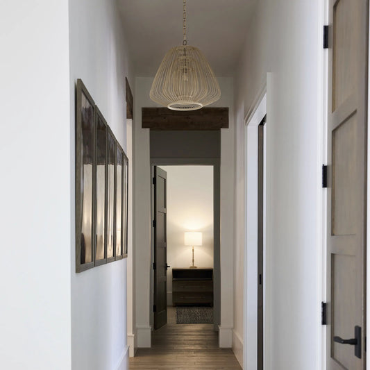 Terrae Triangular Pendant by Cyan Design in aged brass. Made from rattan, metal in a unique style.